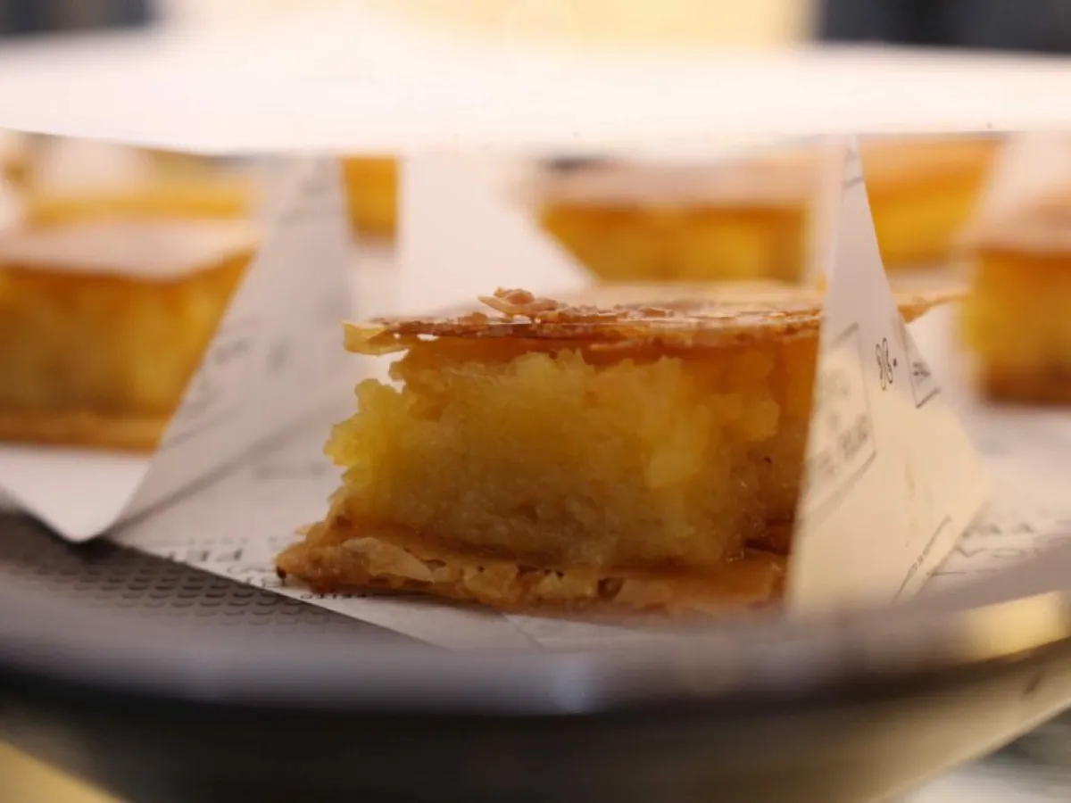 a close up of a portuguese cake