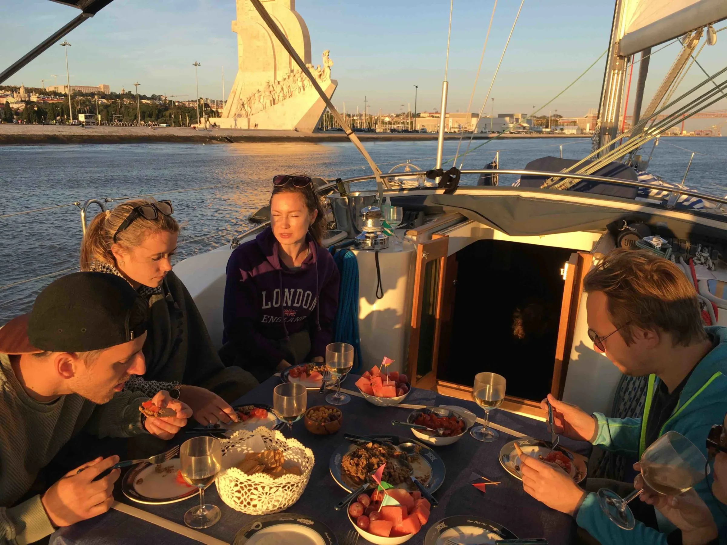 a group of people on a boat in the water