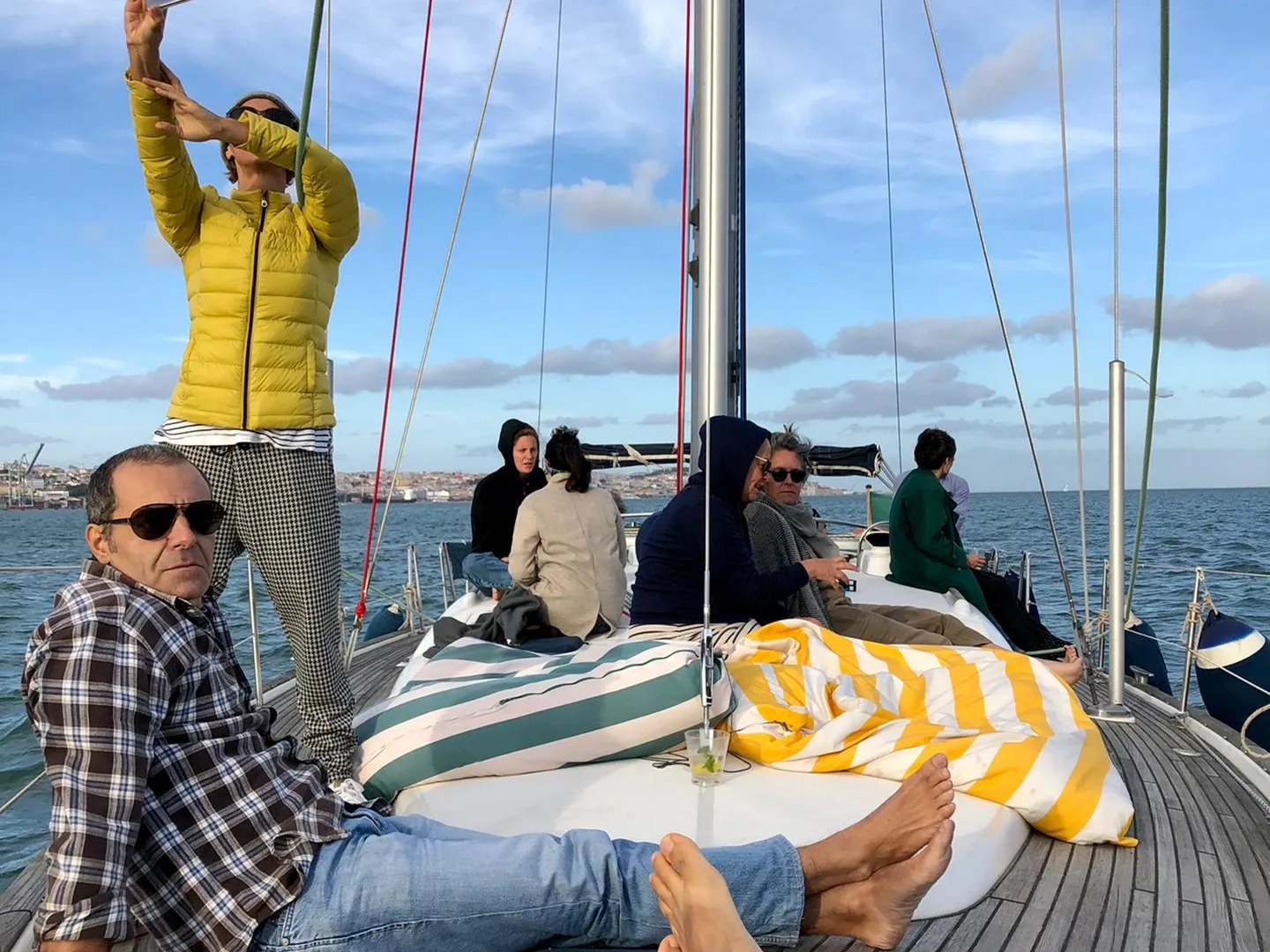a group of people sitting on a boat