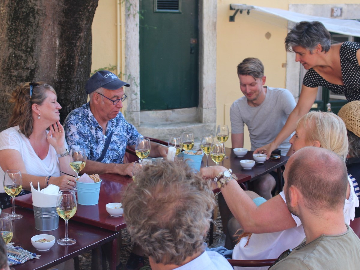 a group of people sitting at a table