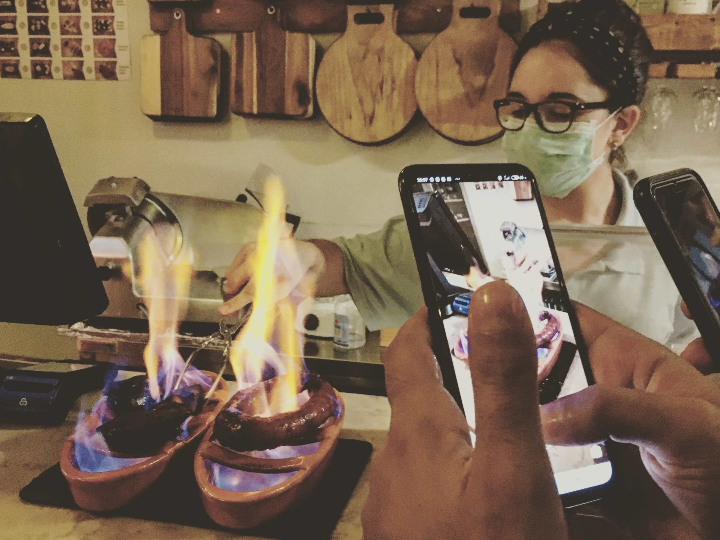 a close up of a person holding a birthday cake