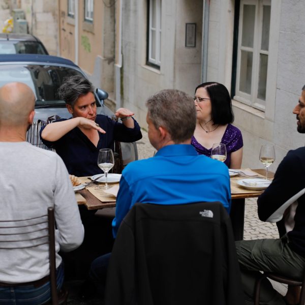 a group of people that are talking to each other