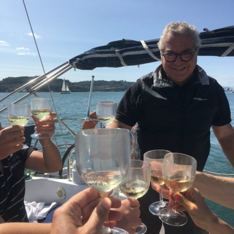 a person holding a glass of water