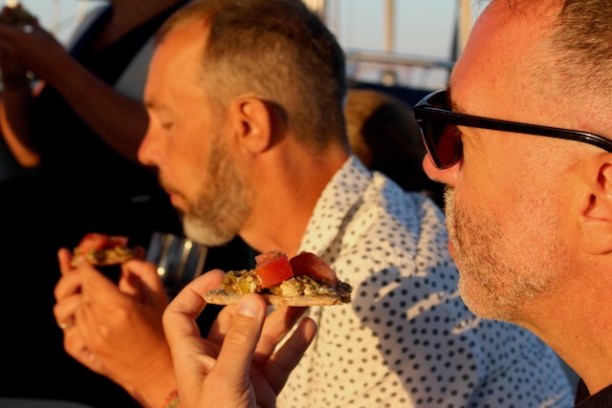 a group of people eating food