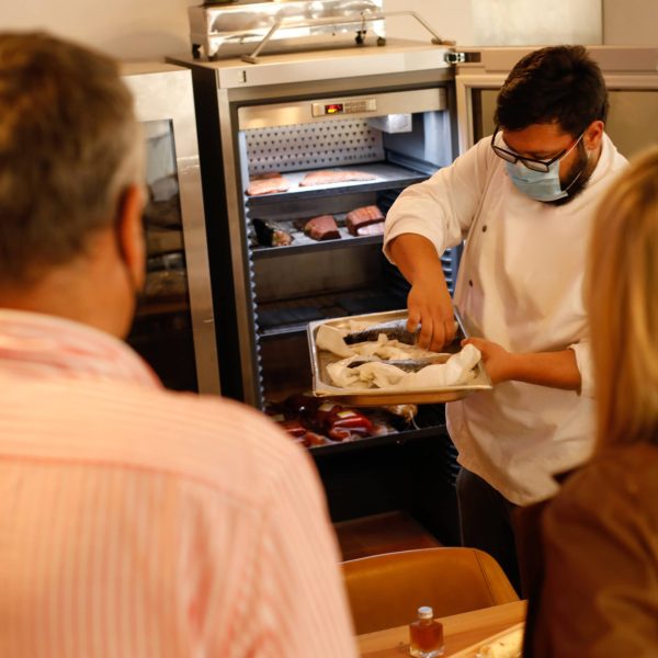 chef showing processed fish he prepared