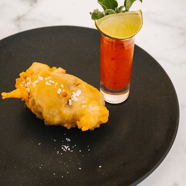 a half eaten banana on a plate