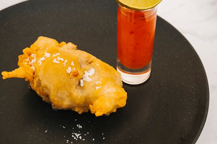 a half eaten banana on a plate