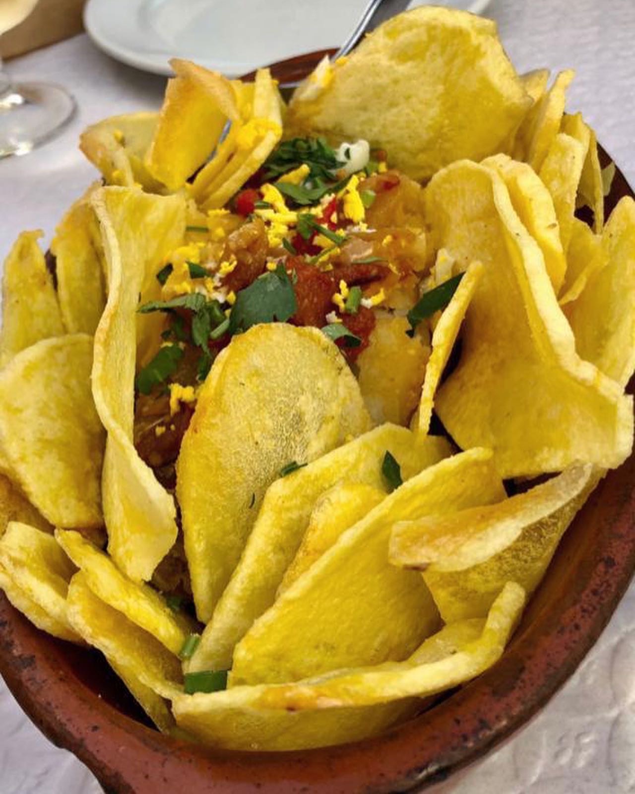 a dish is filled with food