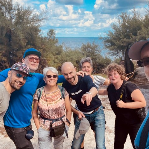 a group of people posing for the camera