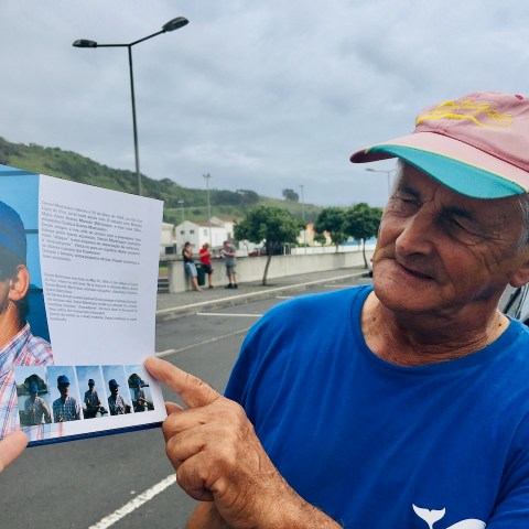 a man wearing a blue hat