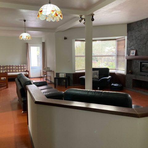 a kitchen with an island in the middle of a room