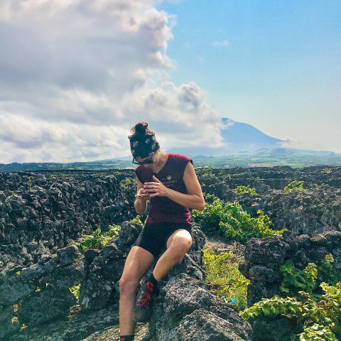 a man riding on top of a mountain
