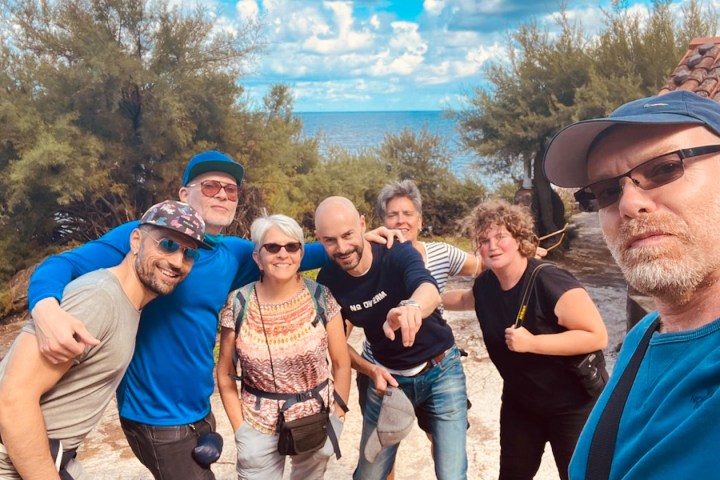 a group of people posing for the camera