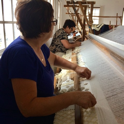 a person standing next to a window