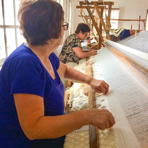 a person standing next to a window