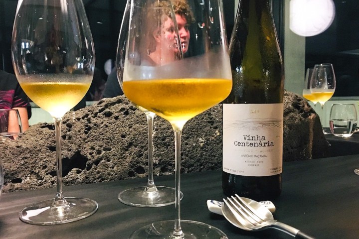 a half empty glasses of wine on a table