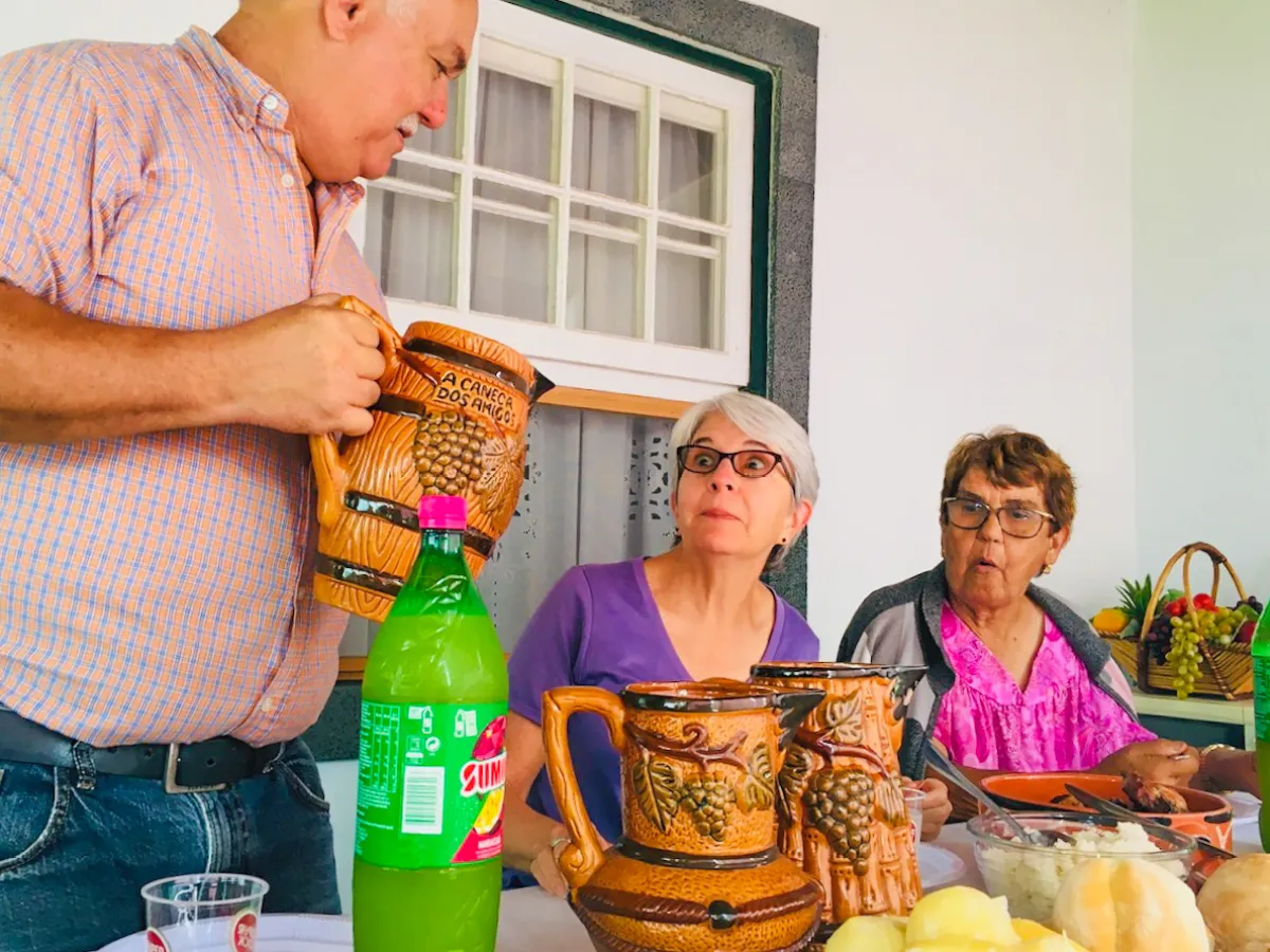 a man holding a glass of wine