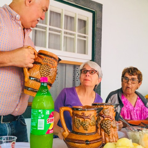 a man holding a glass of wine