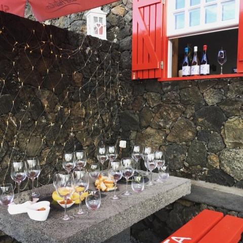 a person sitting in front of a building