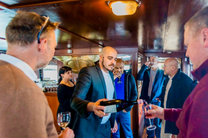 a group of people standing in a room