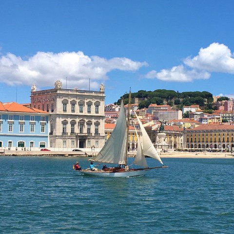 a small boat in a large body of water