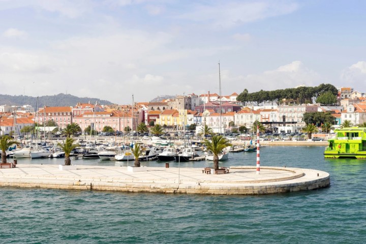 a boat is docked next to a body of water