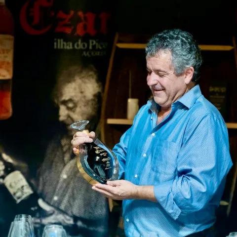 a man holding a bottle