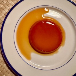 a plate with a cup of coffee