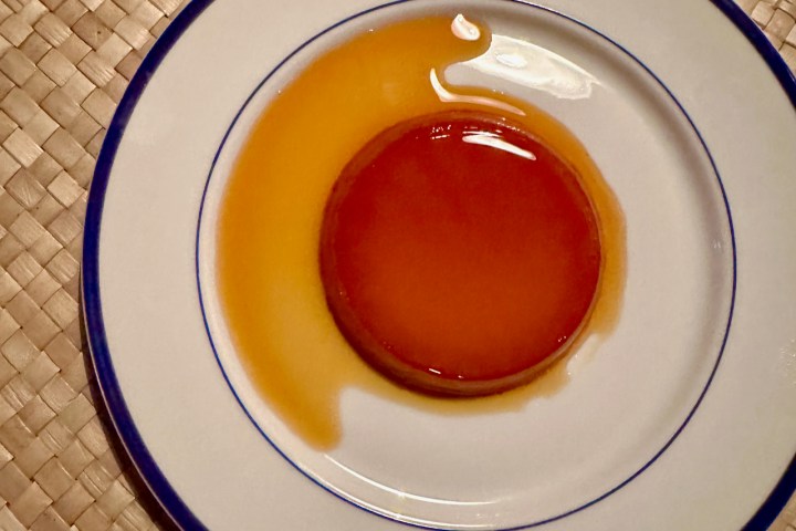 a plate with a cup of coffee