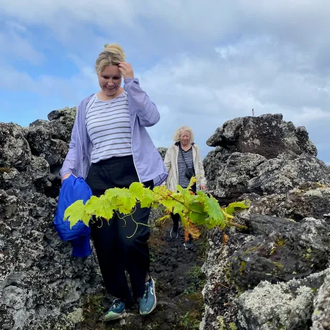 a person standing on a rock