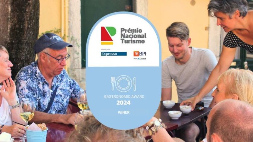 a group of people standing in front of a crowd