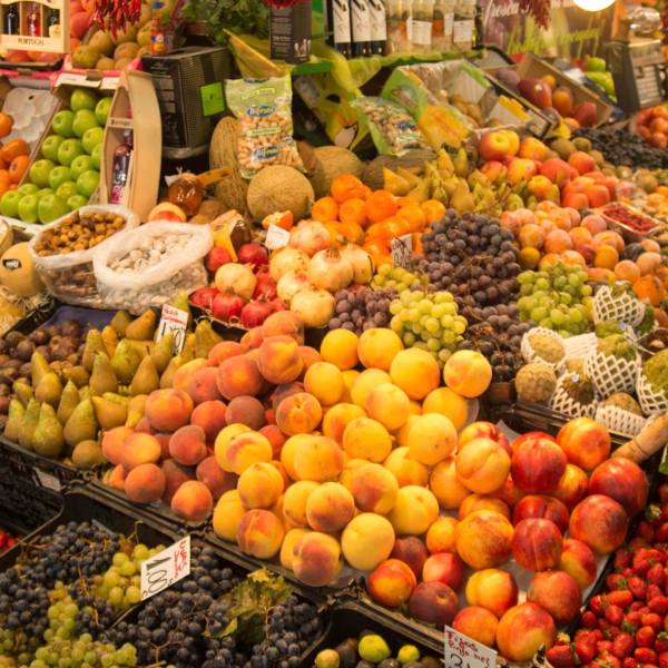 a variety of fresh fruit and vegetables on display in a store
