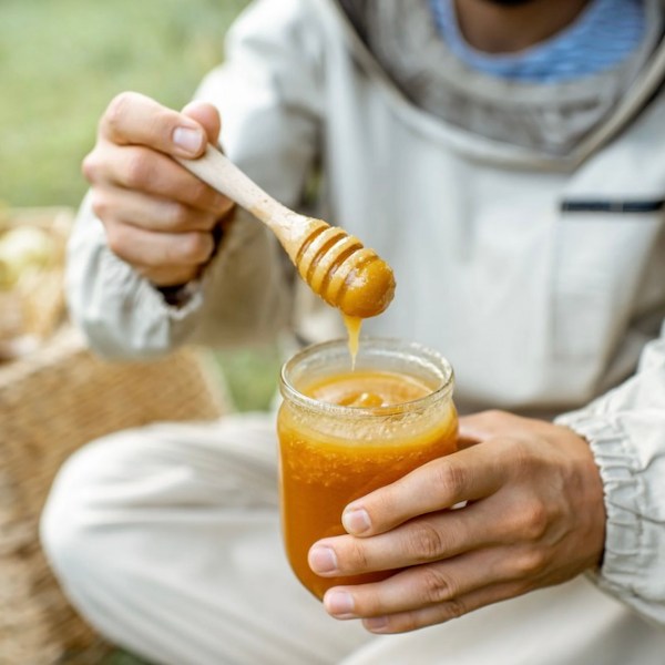 a person drinking from a cup